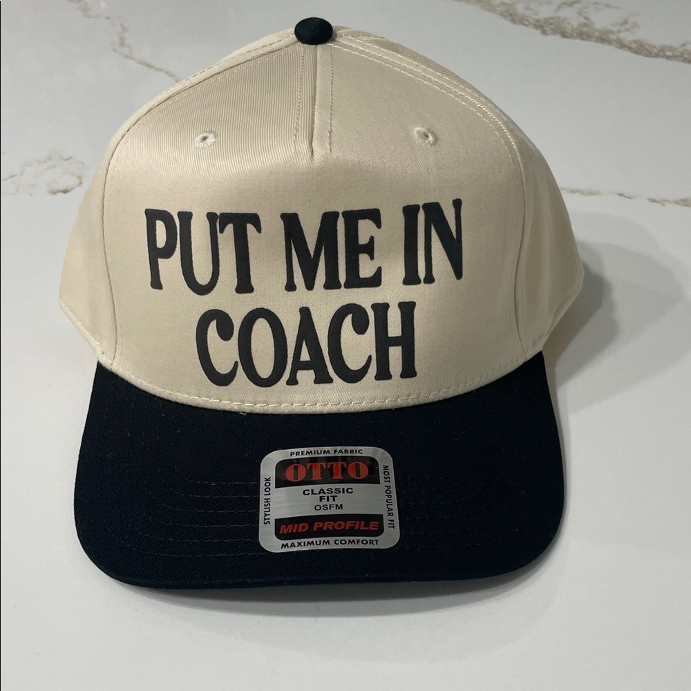 NWT PUT ME IN COACH Cream and Black TRUCKER HAT with Bold Text